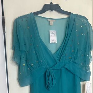 Very cute midi teal colored dress with cropped shrug to match.